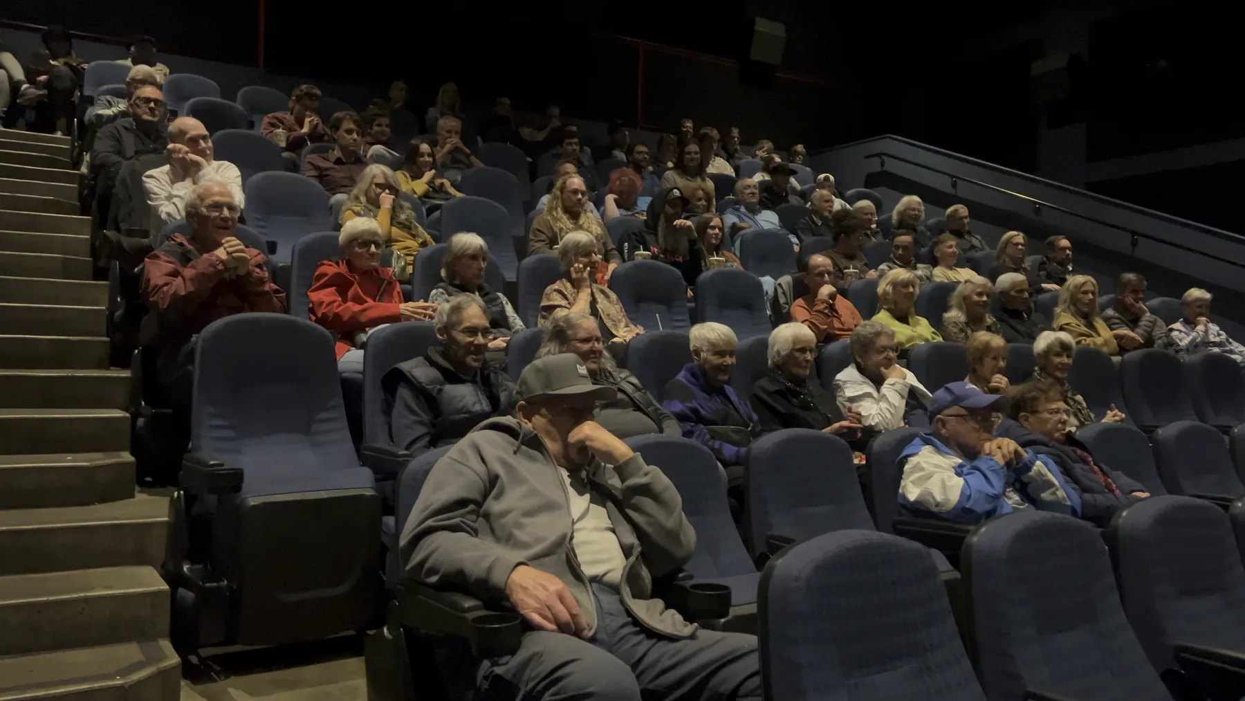 The audience settles in before the screening