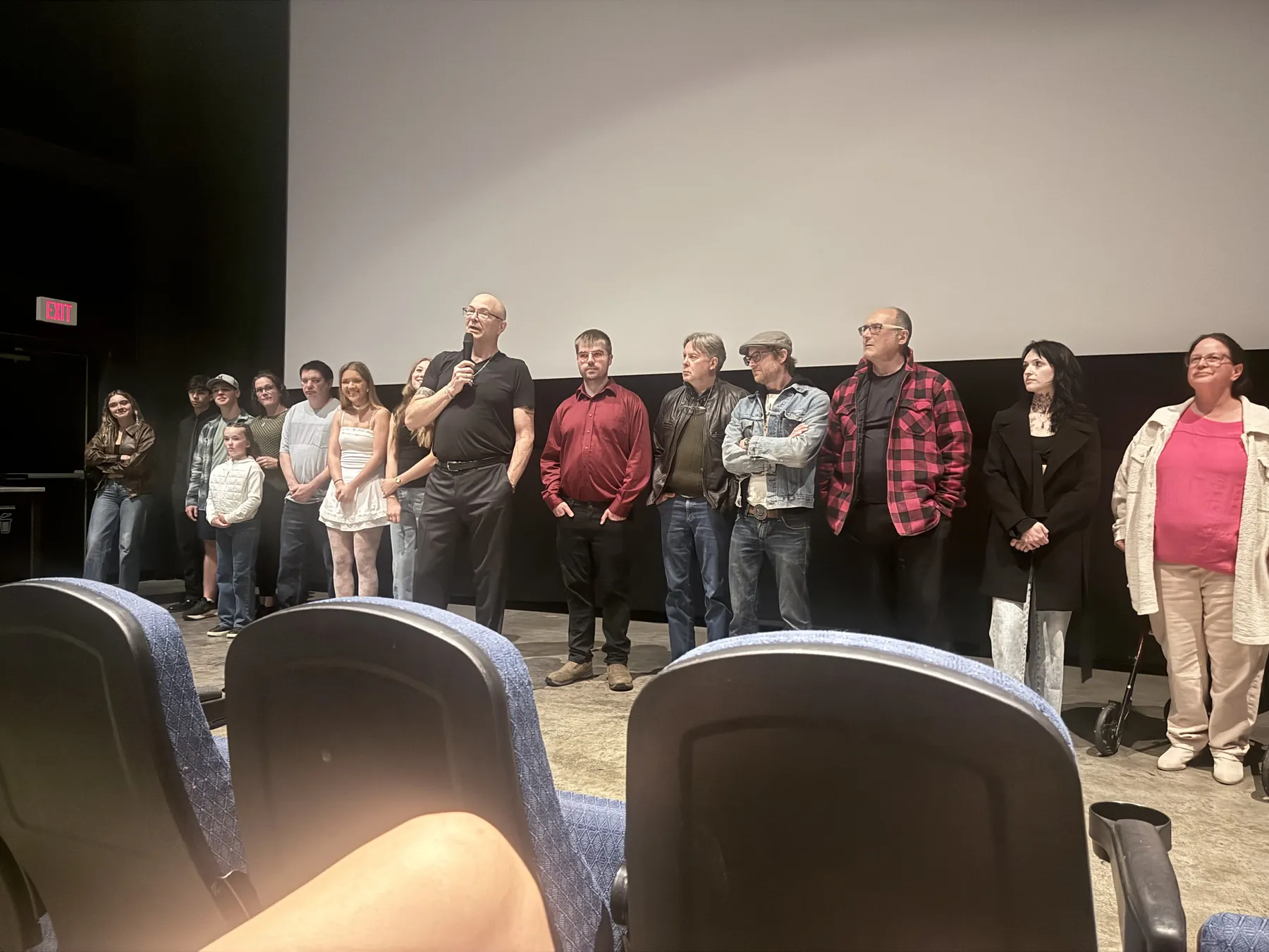 Cast and crew in front of the screen at the Salmar Grand