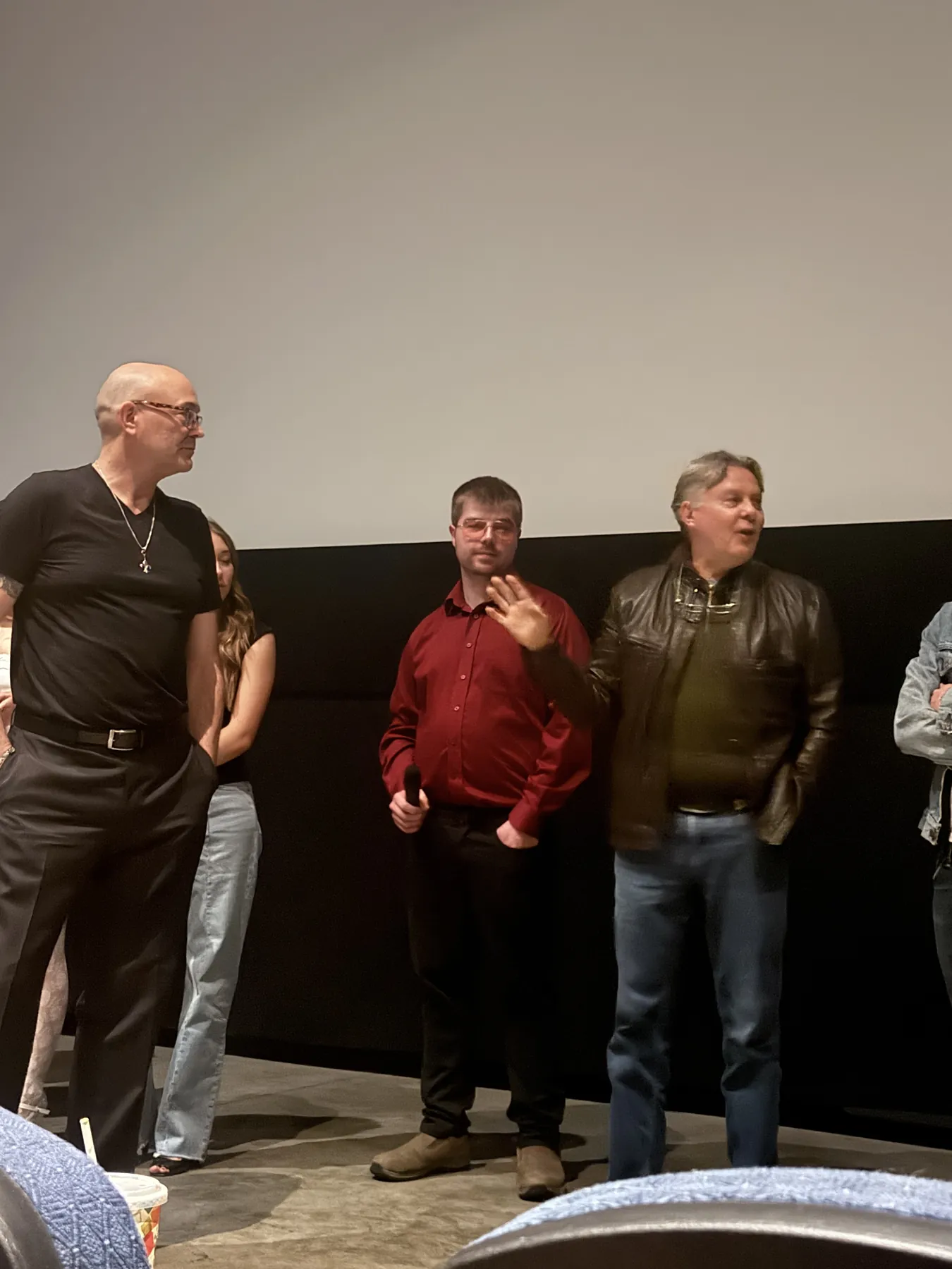 The filmmakers in front of the premiere audience